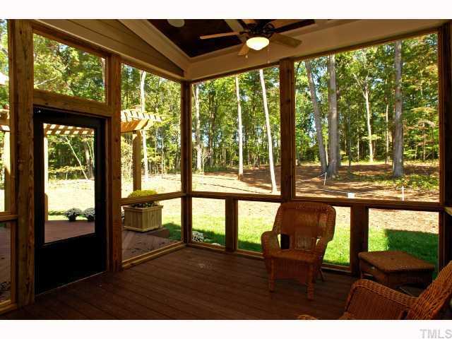 4843 Inwood Road Raleigh, NC 27603 - Photo 11 of 12 a living room with large windows