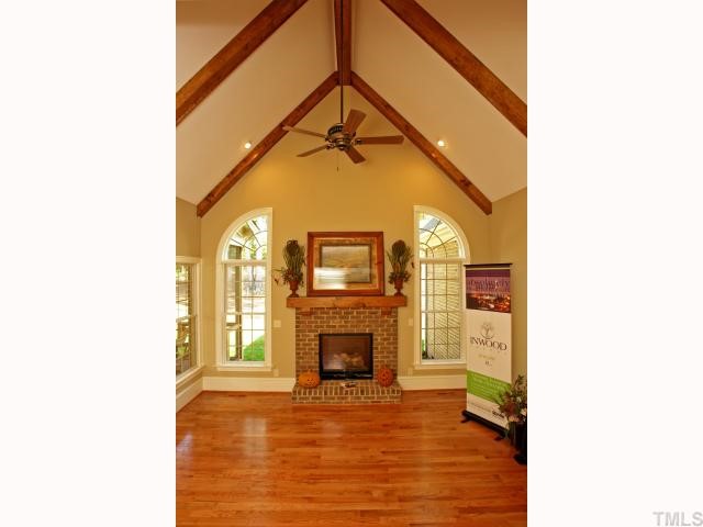 4843 Inwood Road Raleigh, NC 27603 - Photo 5 of 12 a view of a livingroom with a fireplace