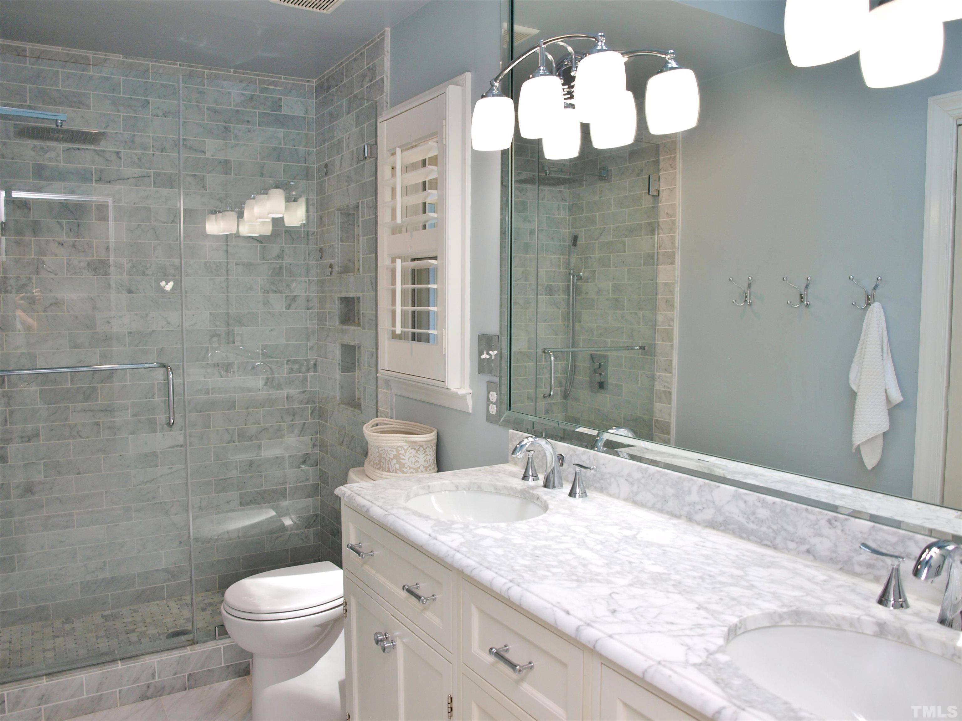 2905 Bolo Trail Raleigh, NC 27615 - Photo 11 of 25 a bathroom with a granite countertop sink toilet and shower