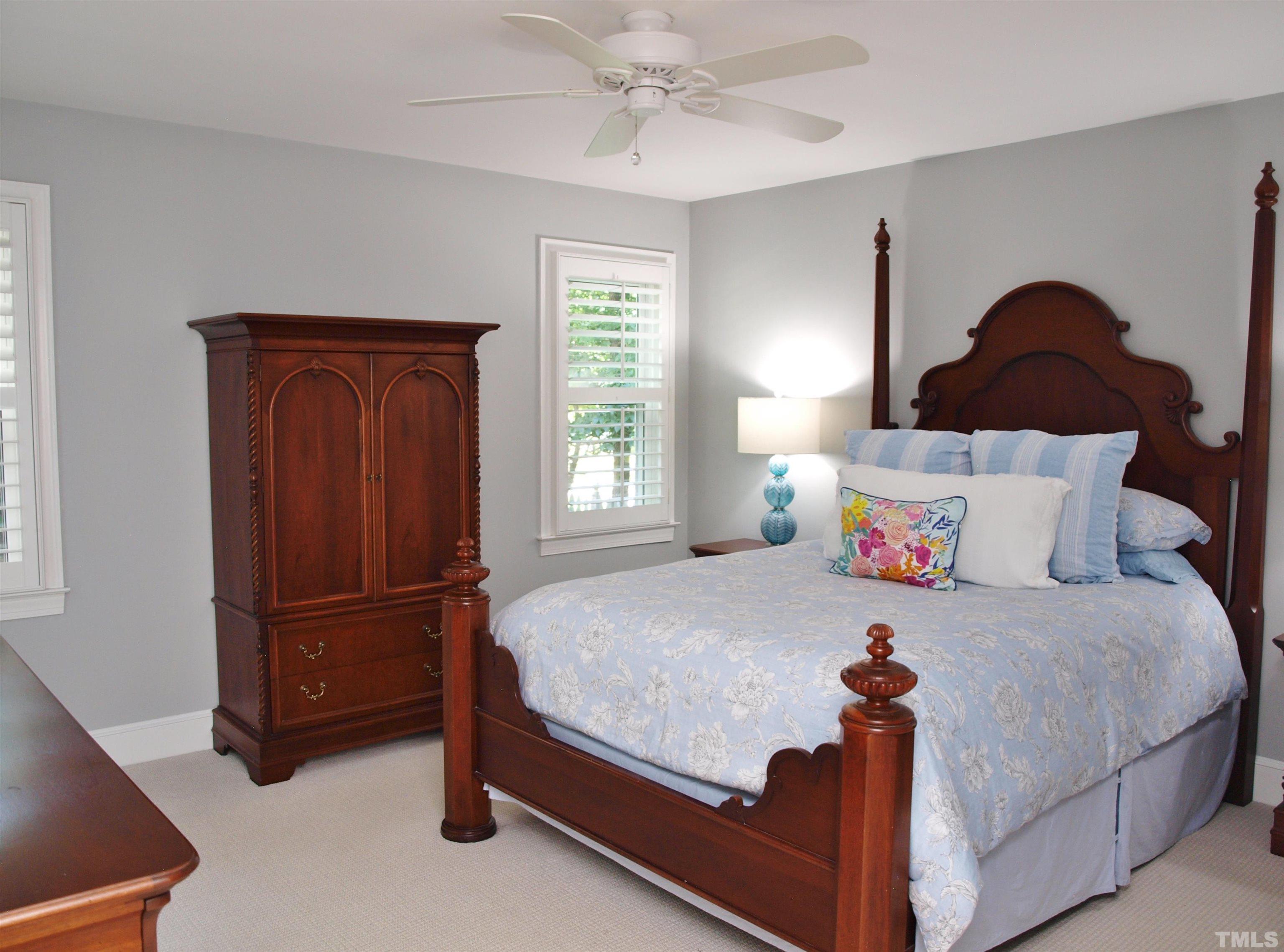 2905 Bolo Trail Raleigh, NC 27615 - Photo 12 of 25 a bedroom with a bed and a window