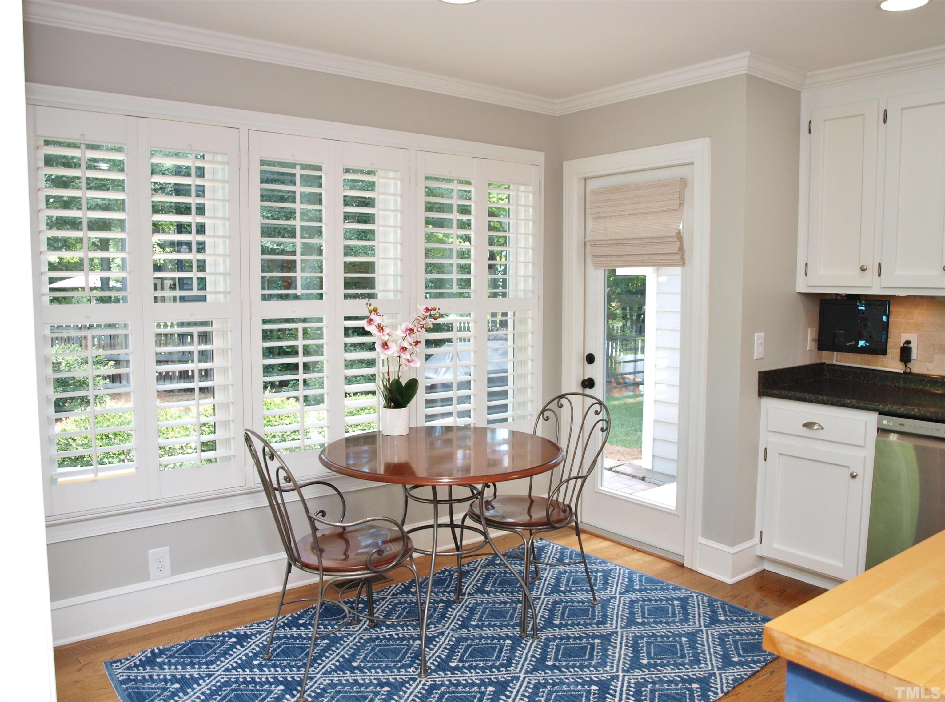 2905 Bolo Trail Raleigh, NC 27615 - Photo 3 of 25 a dining room with furniture and windows