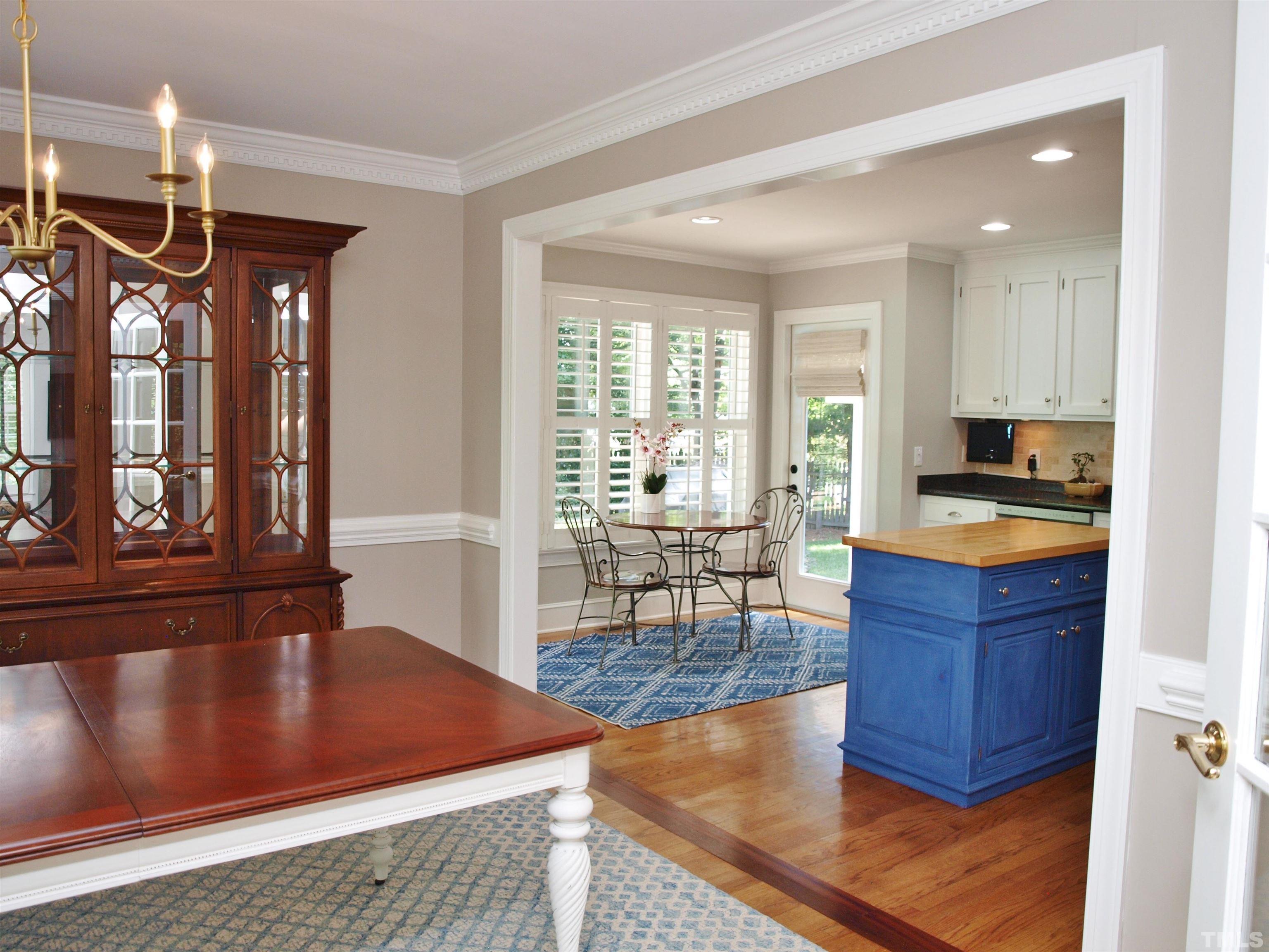 2905 Bolo Trail Raleigh, NC 27615 - Photo 7 of 25 a living room with furniture and wooden floor