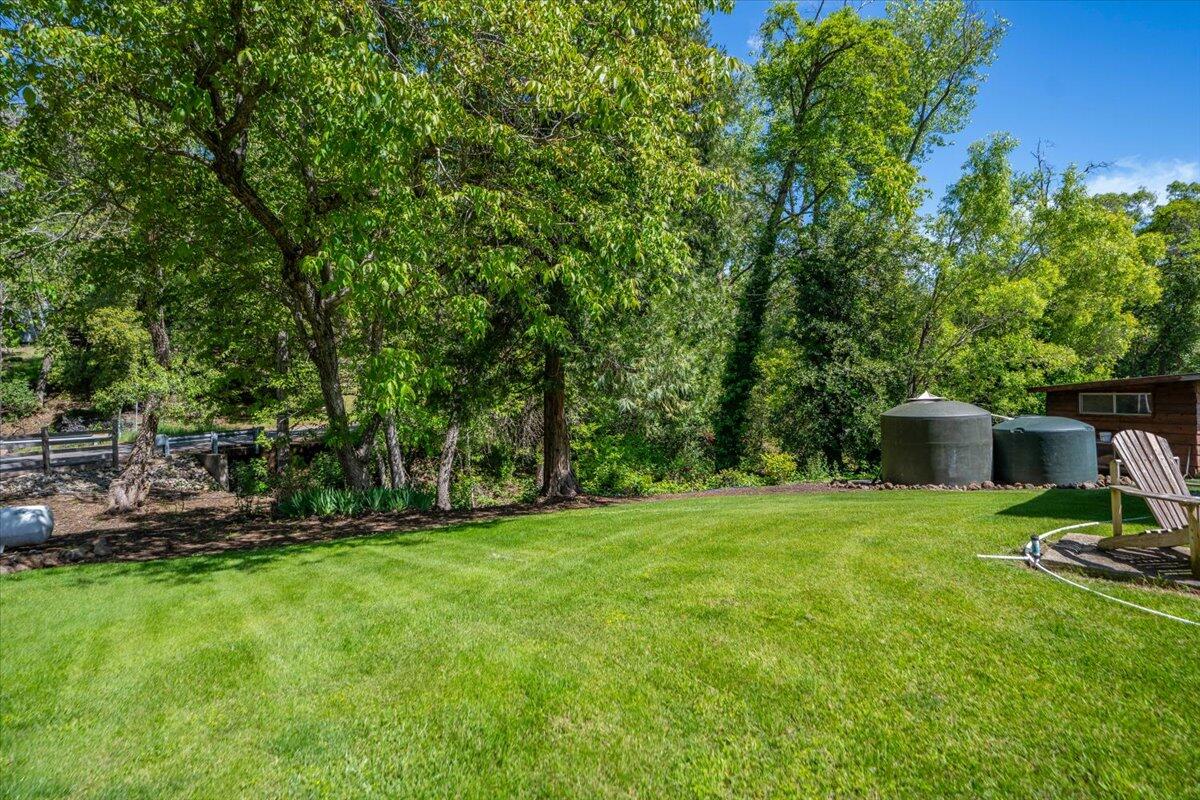 6057 Wilson Hill Road Manton, CA 96059 - Photo 29 of 63 side yard and water storage