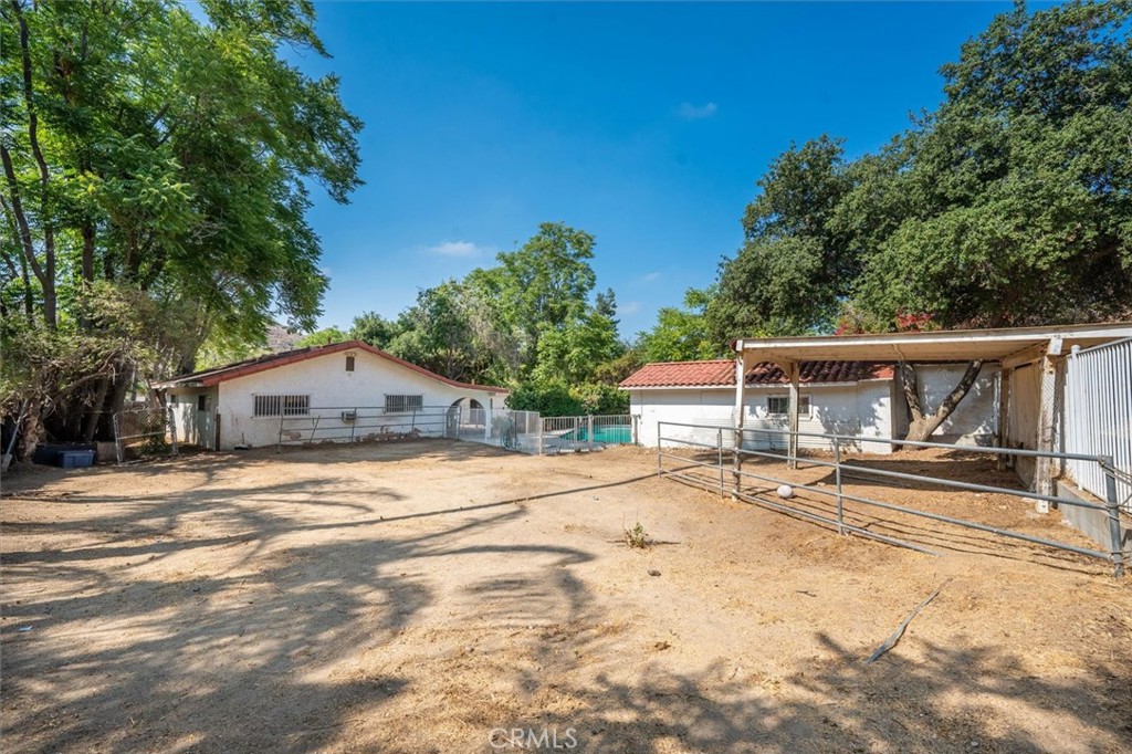 9953 La Tuna Canyon Road Sun Valley, CA 91352 - Photo 29 of 32 a view of a house with a yard and large tree