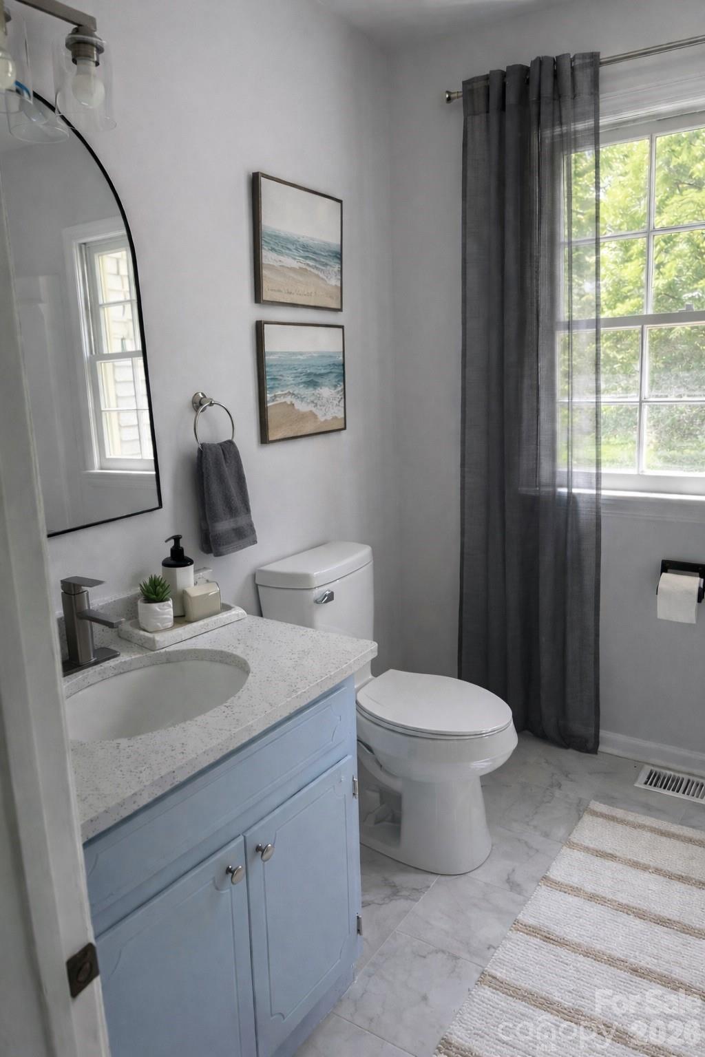 509 California Circle York, SC 29745 - Photo 15 of 26 a bathroom with a toilet sink and mirror