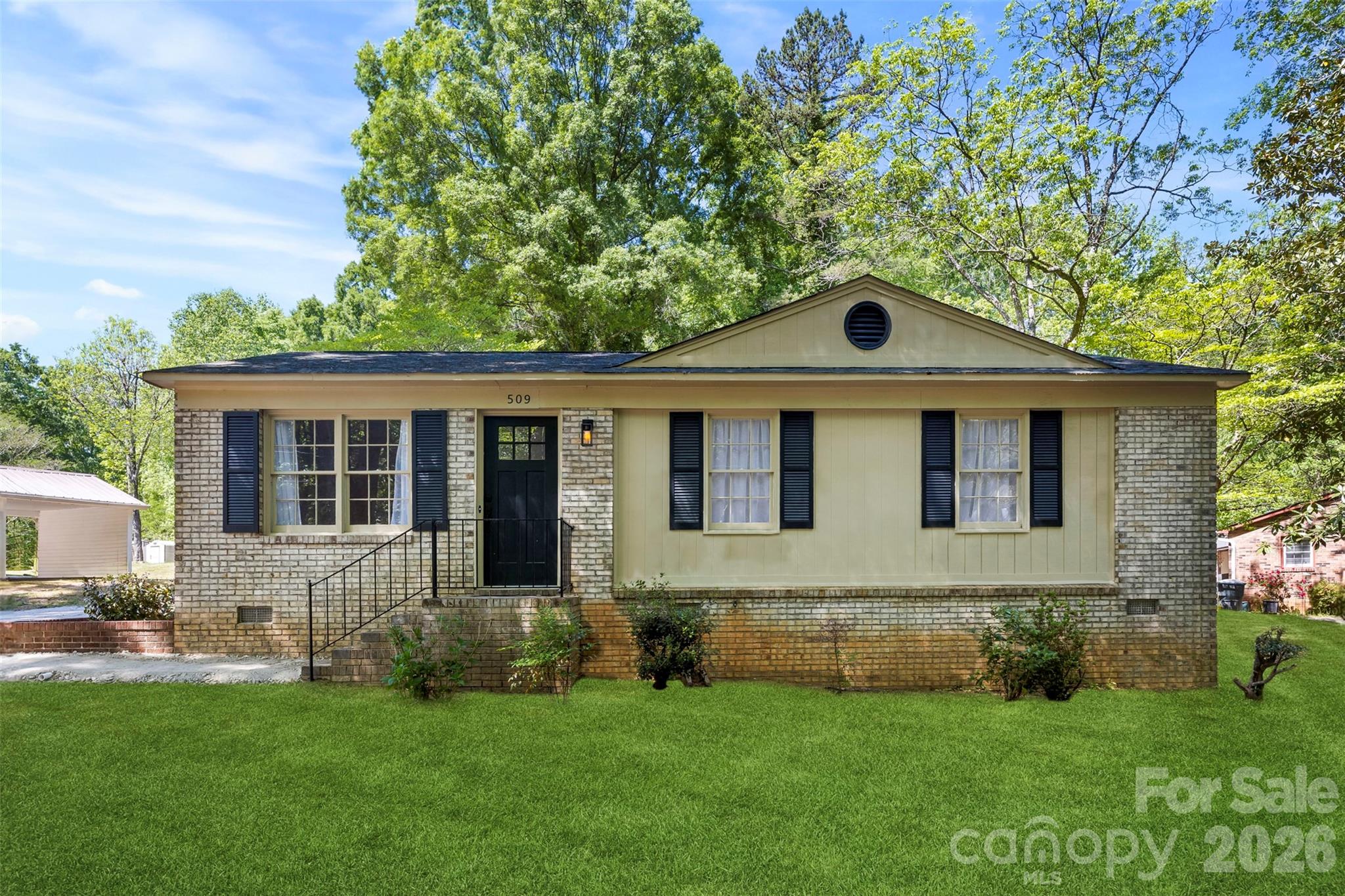 509 California Circle York, SC 29745 - Photo 2 of 26 a front view of a house with a yard