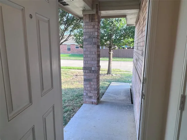 a kitchen with sink cabinets and window