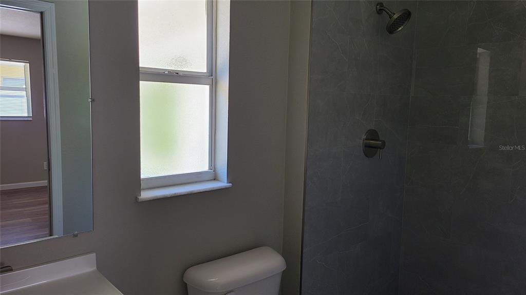 4611 West Villa Rosa Street Tampa, FL 33611 - Photo 11 of 22 a bathroom with a toilet