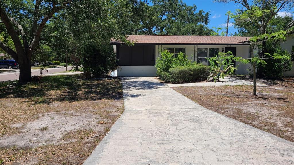 4611 West Villa Rosa Street Tampa, FL 33611 - Photo 2 of 22 a view of a house with garden