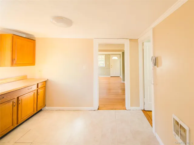 a view of a kitchen with a sink