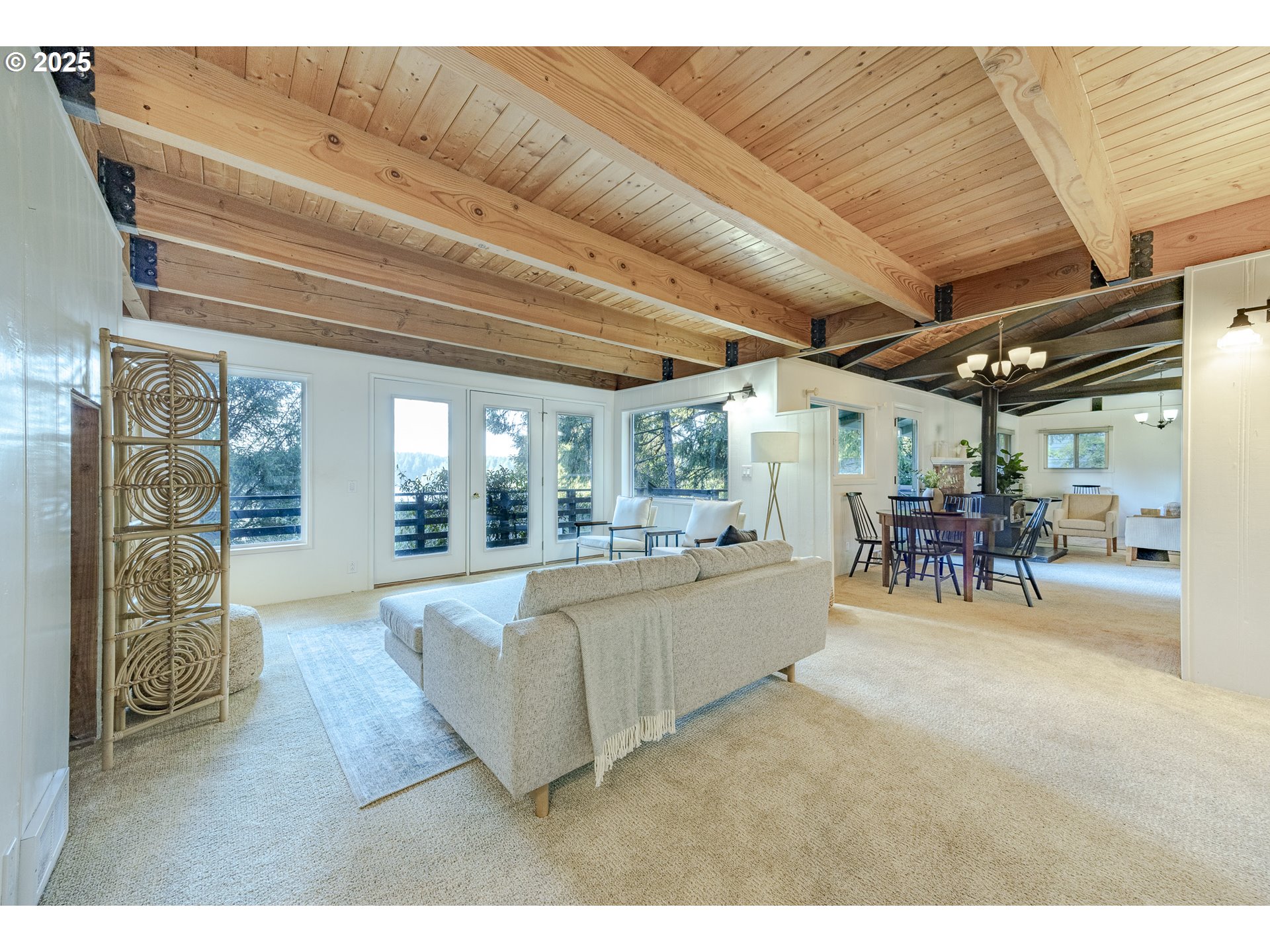 83694 Rio Road Florence, OR 97439 - Photo 16 of 45 a living room with furniture and a table