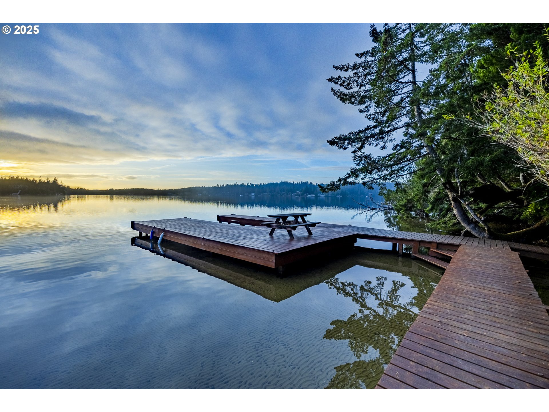 83694 Rio Road Florence, OR 97439 - Photo 2 of 45 a view of a backyard with sitting area