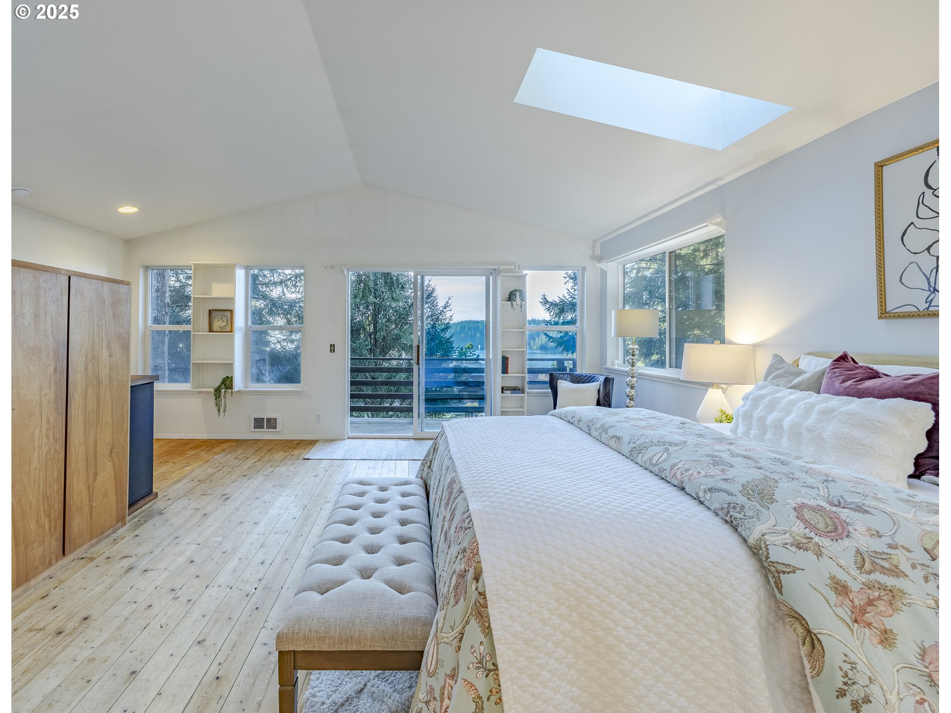 83694 Rio Road Florence, OR 97439 - Photo 26 of 45 a bedroom with a large bed and a window