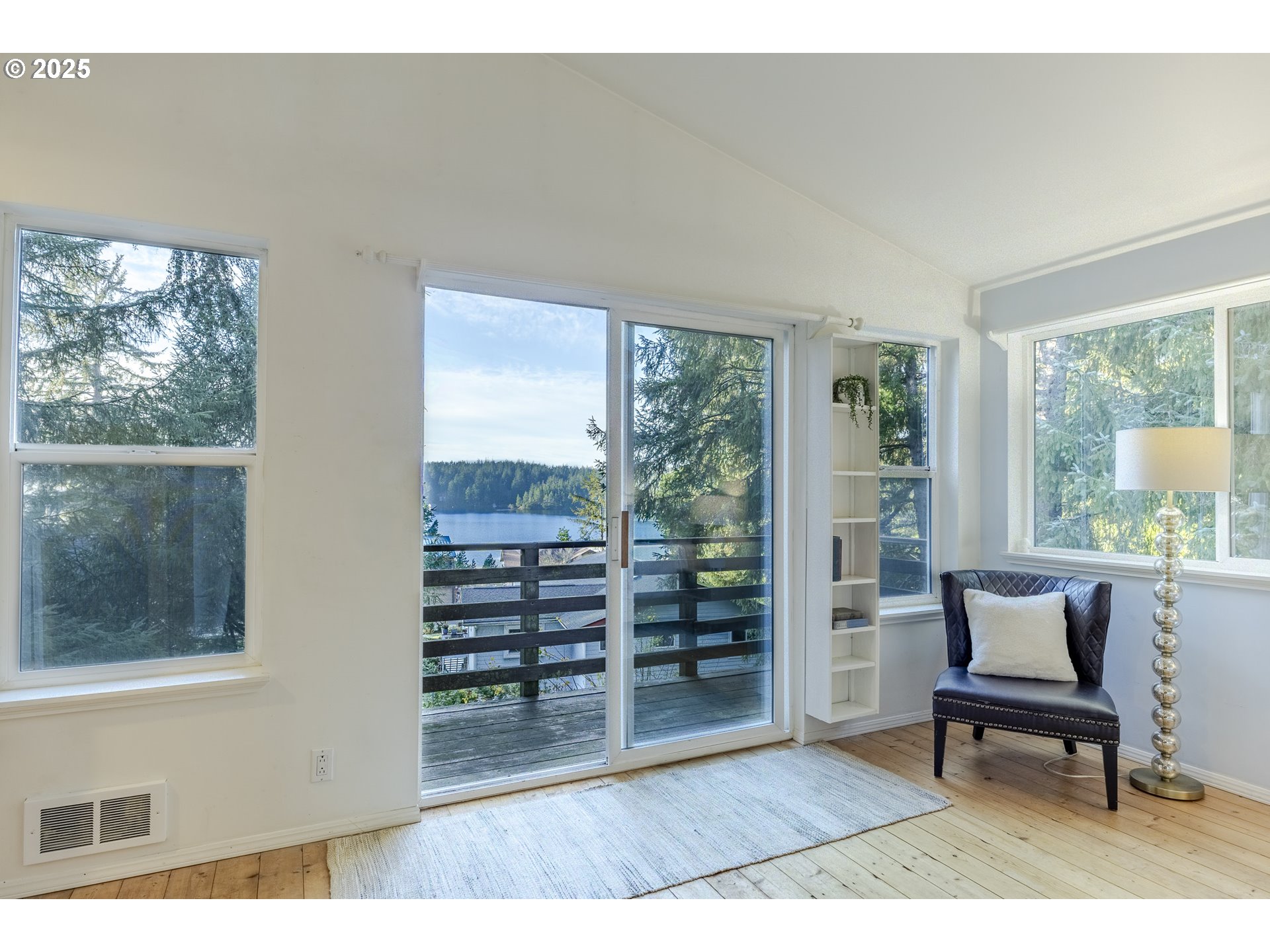 83694 Rio Road Florence, OR 97439 - Photo 27 of 45 a living room with furniture and a window