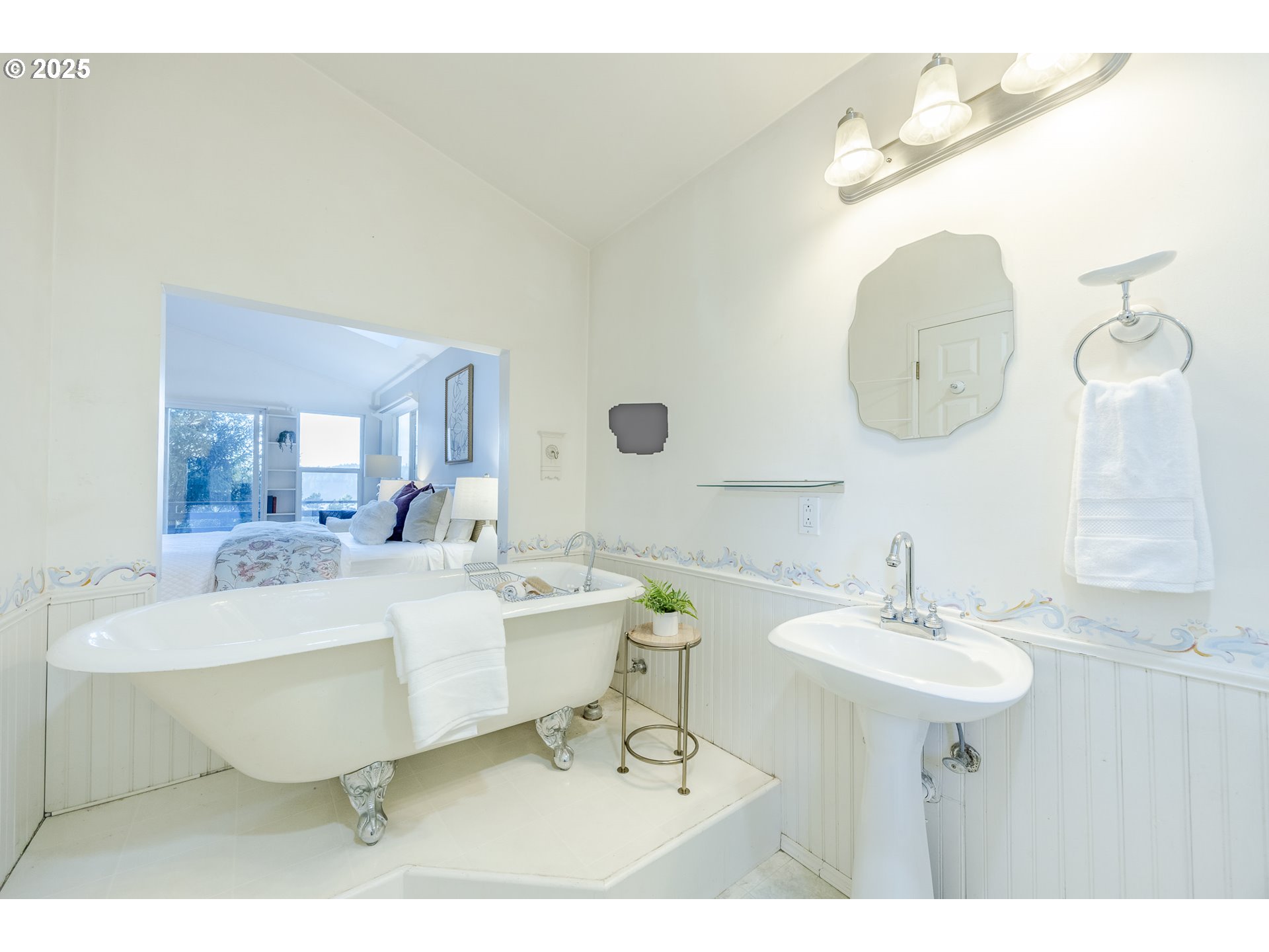 83694 Rio Road Florence, OR 97439 - Photo 28 of 45 a bathroom with a sink mirror and a mirror