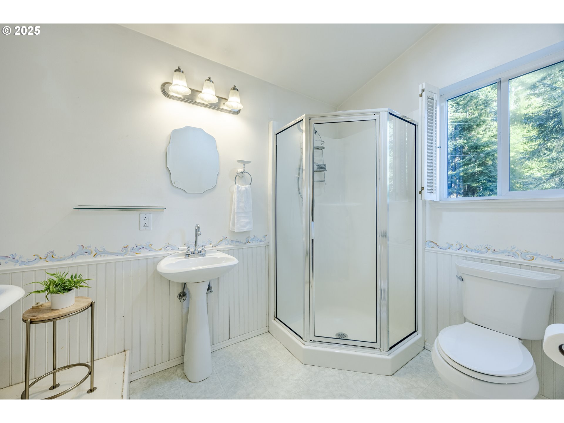 83694 Rio Road Florence, OR 97439 - Photo 30 of 45 a bathroom with a sink a toilet and a mirror