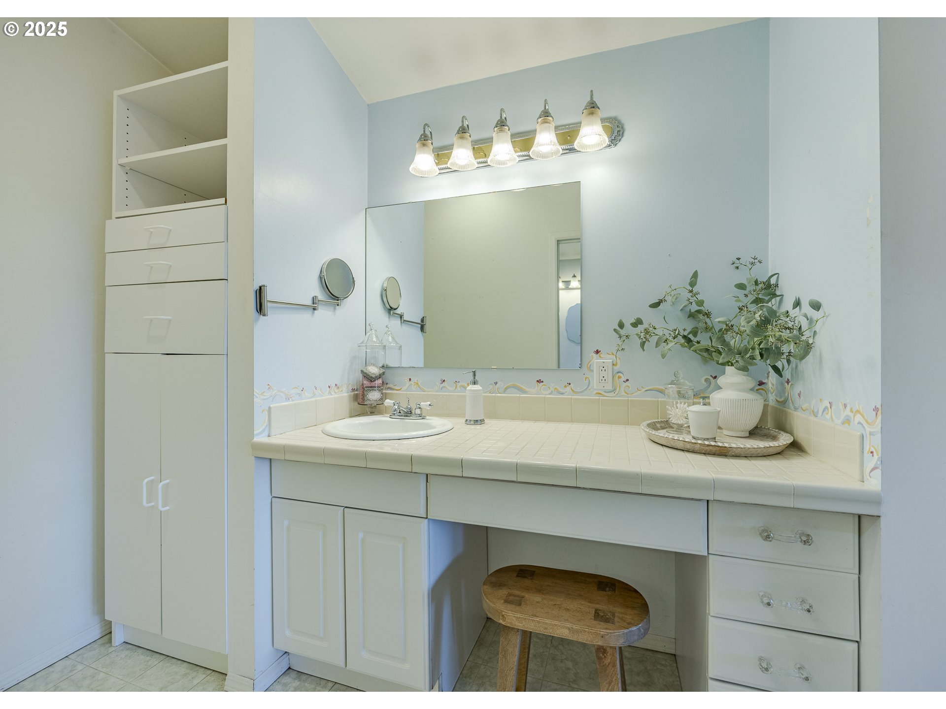 83694 Rio Road Florence, OR 97439 - Photo 31 of 45 a bathroom with a sink and a mirror