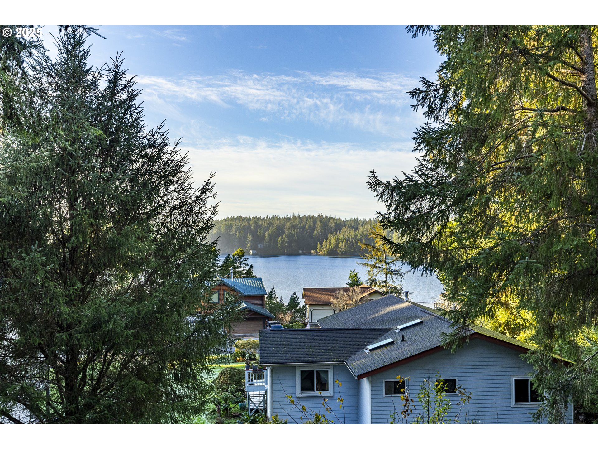 83694 Rio Road Florence, OR 97439 - Photo 33 of 45 a house view with a sink and a garden