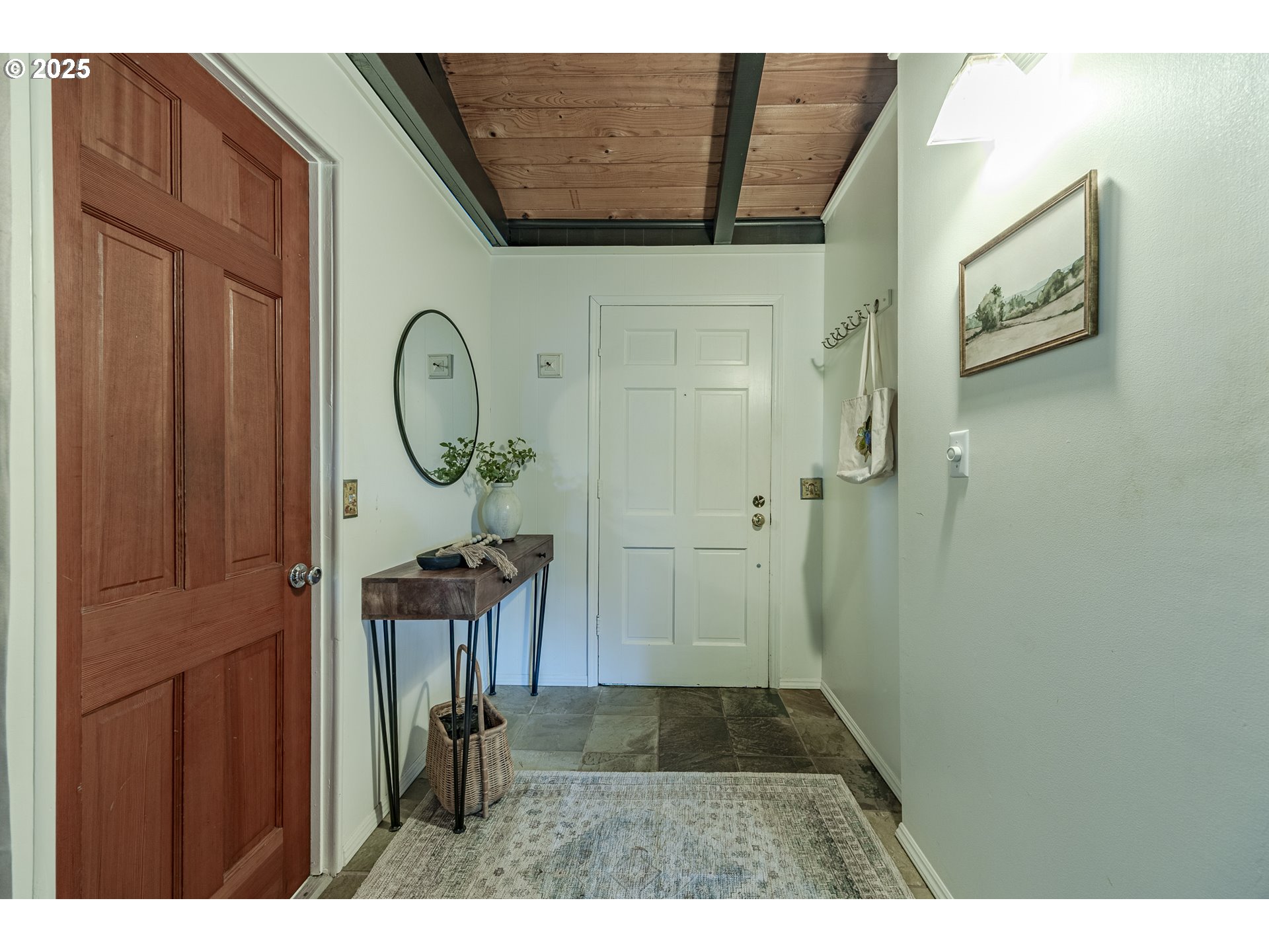 83694 Rio Road Florence, OR 97439 - Photo 4 of 45 a view of a hallway with wooden shelves