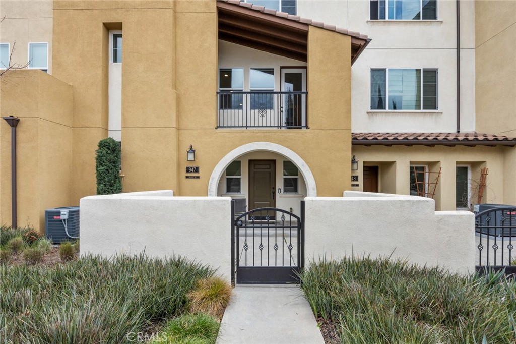 947 East Drapery Lane Anaheim, CA 92802 - Photo 1 of 1 a front view of a house with a yard
