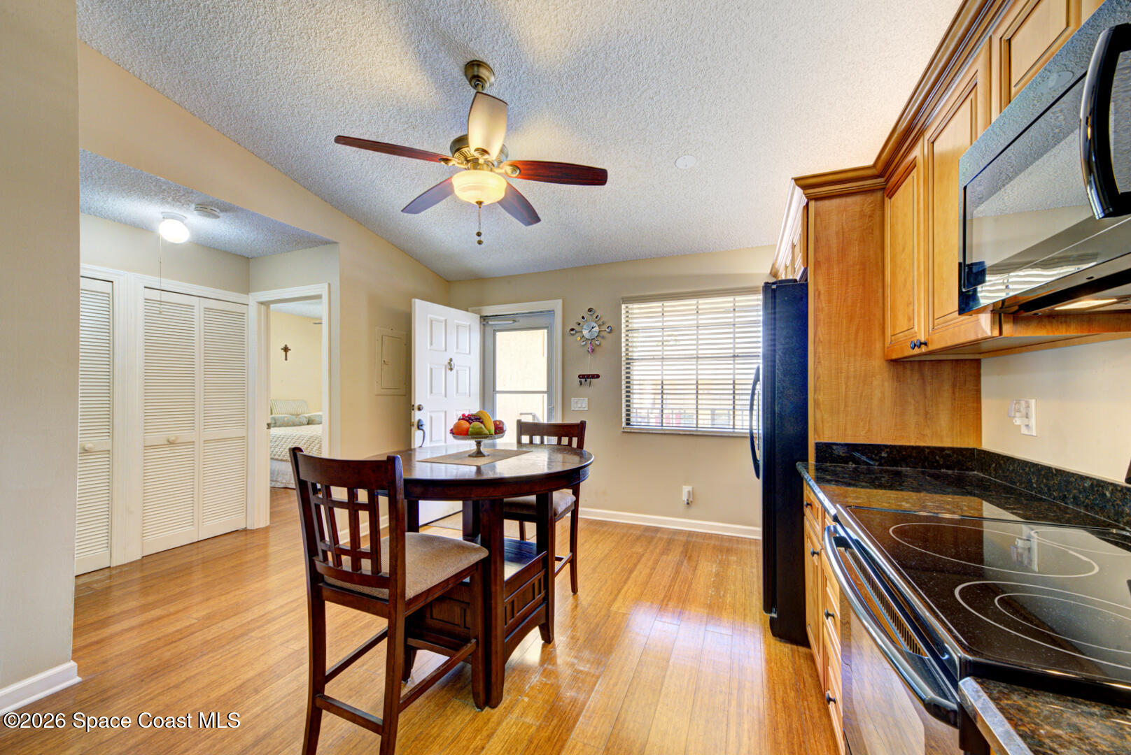 1142 Keystone Drive, Unit F Jupiter, FL 33458 - Photo 9 of 43 kitchen with fan