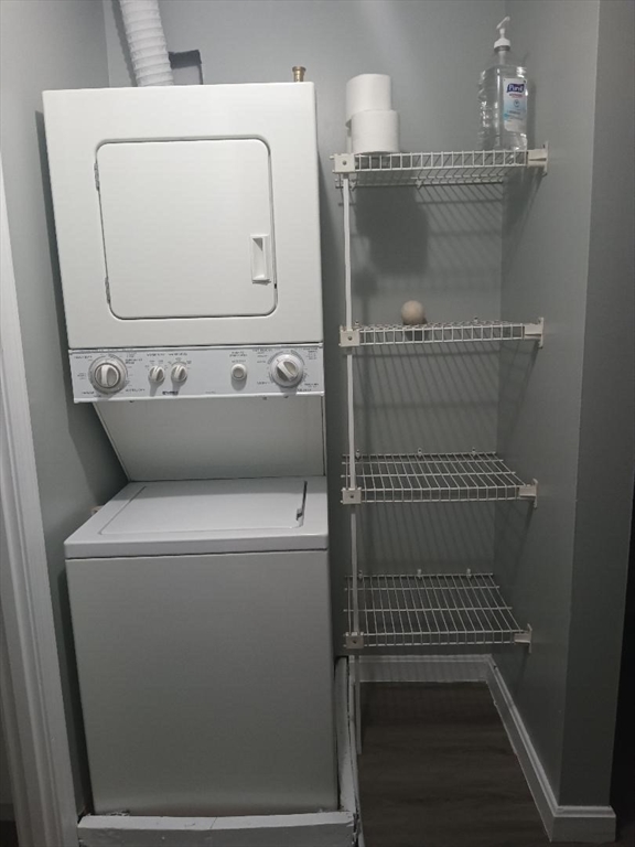 1821 Middlesex Street, Unit 10 Lowell, MA 01851 - Photo 5 of 6 a utility room with dryer and washer