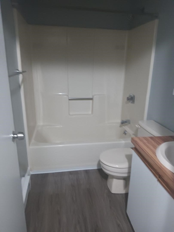 1821 Middlesex Street, Unit 10 Lowell, MA 01851 - Photo 6 of 6 a bathroom with a sink and toilet