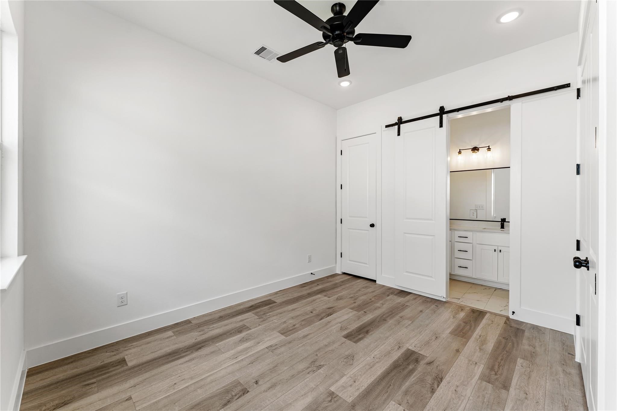8506 Wileyvale Road, Unit A Houston, TX 77016 - Photo 18 of 25 Ensuite bathroom with modern sliding doors