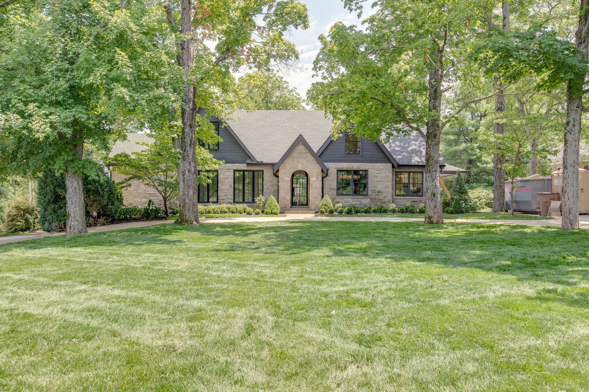 3800 Estes Road Nashville, TN 37215 - Photo 12 of 50 a front view of a house with a garden and trees