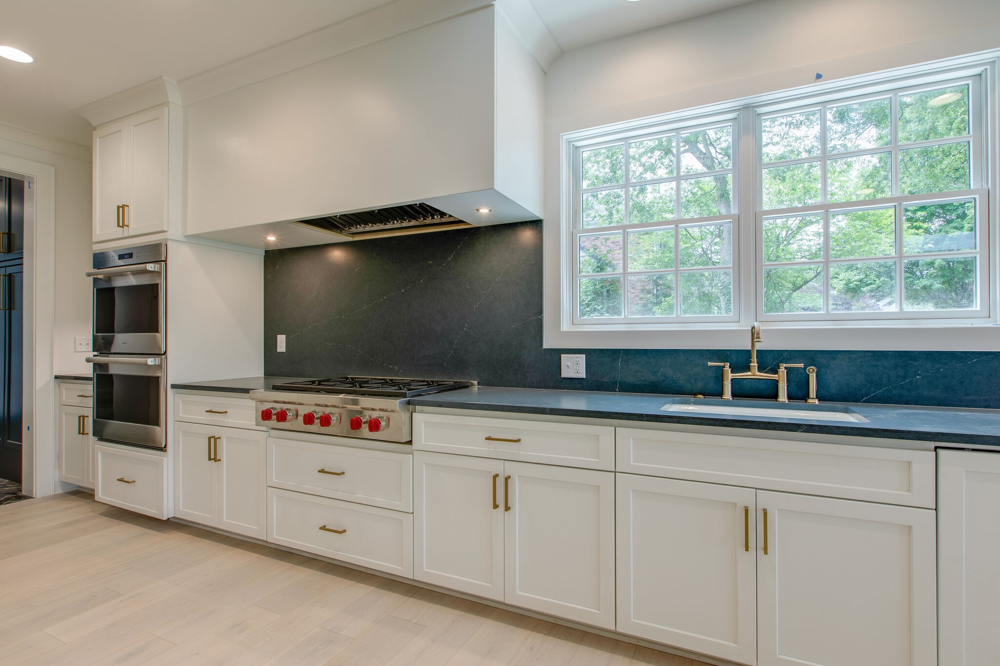 3800 Estes Road Nashville, TN 37215 - Photo 25 of 50 a kitchen with granite countertop a sink and a stove top oven
