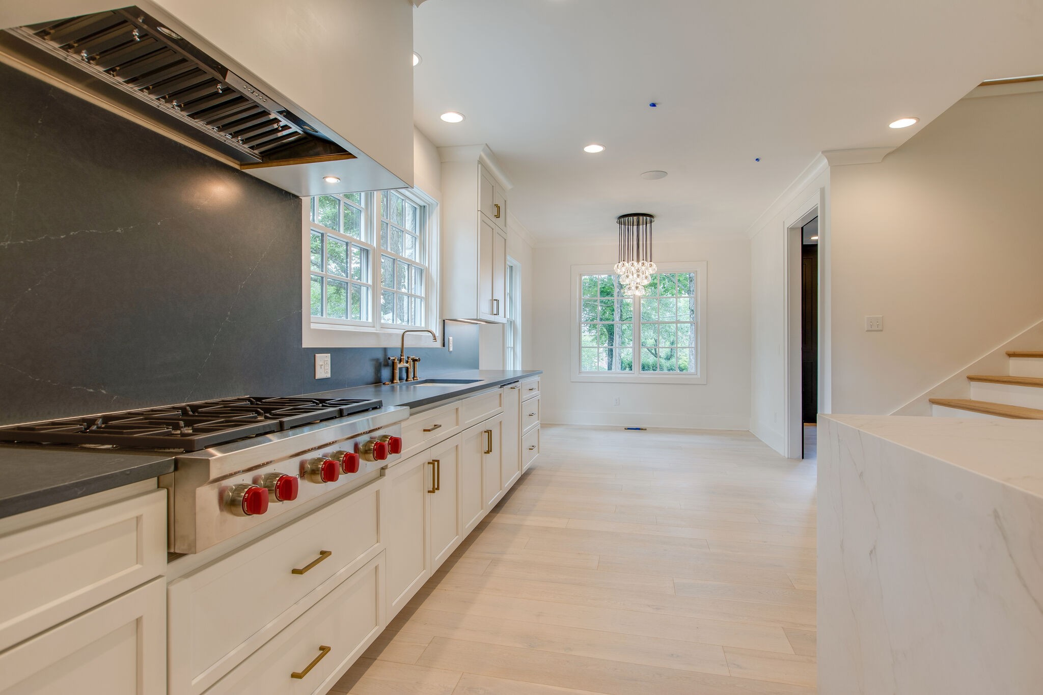 3800 Estes Road Nashville, TN 37215 - Photo 28 of 50 a kitchen with granite countertop a stove and a sink