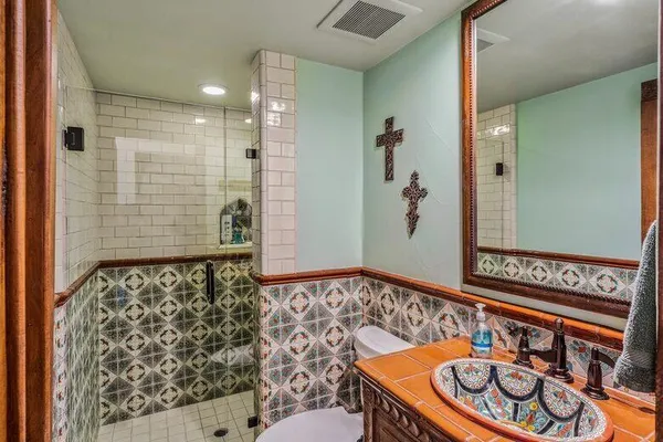 a swimming pool with outdoor seating