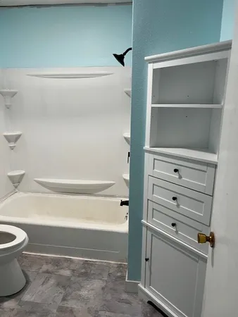 a view of an empty room with window