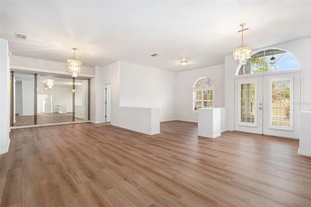 a view of an empty room and window