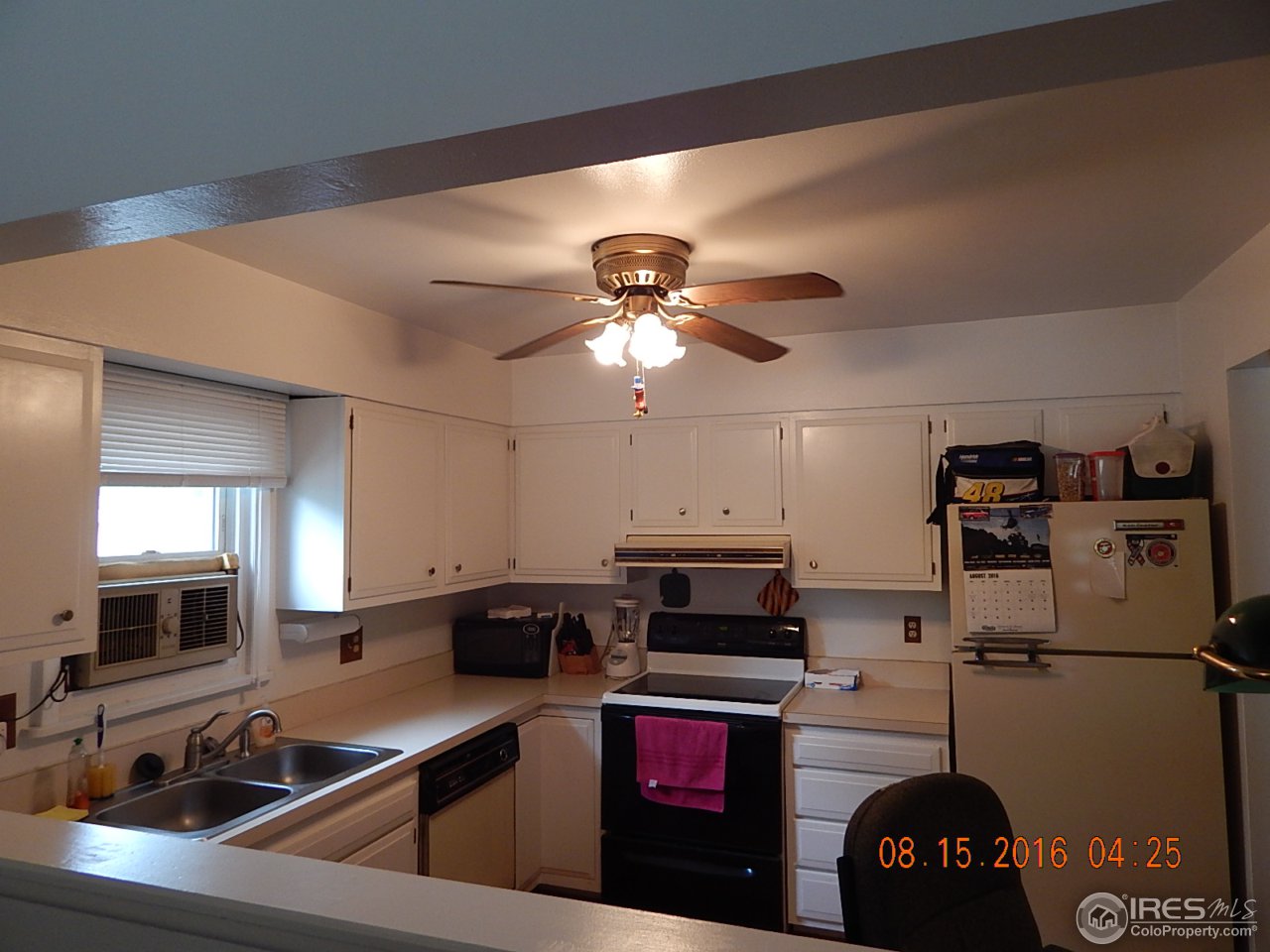 1600 Edora Road Fort Collins, CO 80525 - Photo 7 of 15 Kitchen from Living Room