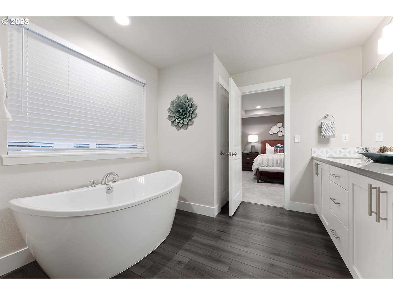 8903 North 5th Street, Unit 63 Ridgefield, WA 98642 - Photo 17 of 32 a spacious bathroom with a white tub sink