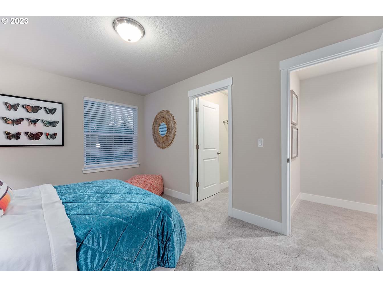8903 North 5th Street, Unit 63 Ridgefield, WA 98642 - Photo 22 of 32 a bedroom with a bed and a window