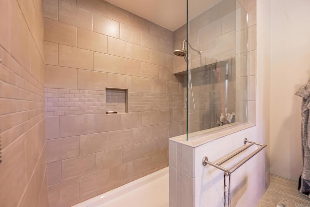 4650 Dulin Road, Unit 126 Fallbrook, CA 92003 - Photo 14 of 41 a bathroom with a shower and a sink