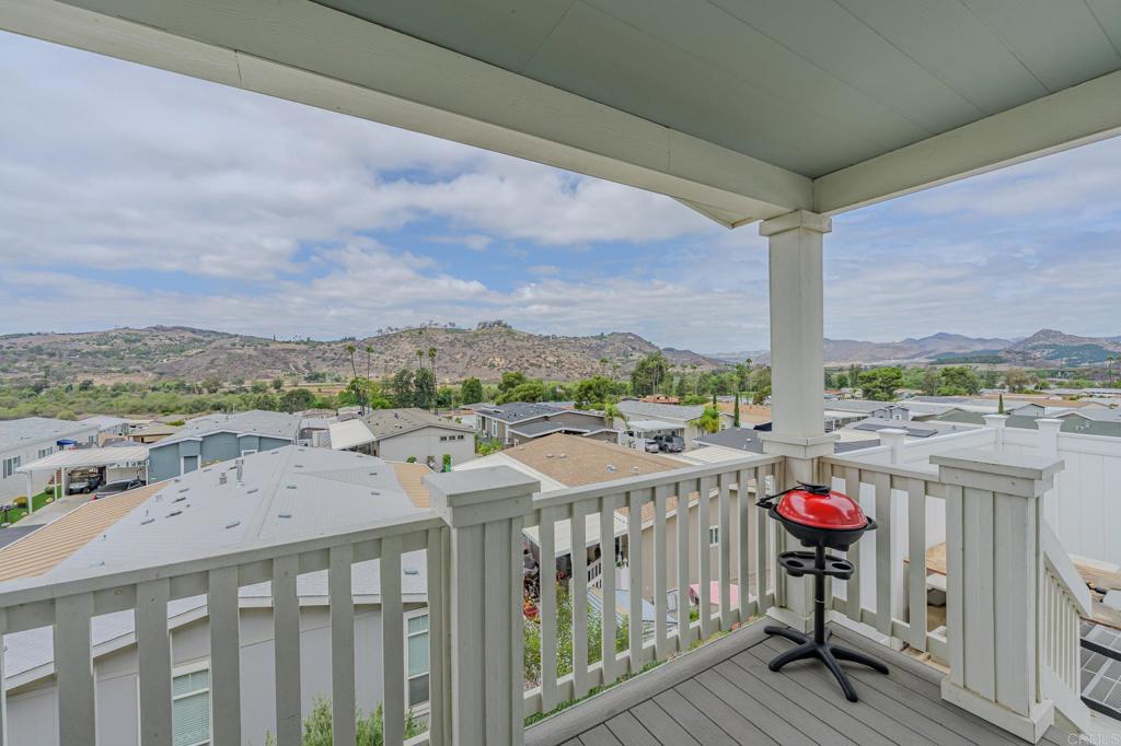 4650 Dulin Road, Unit 126 Fallbrook, CA 92003 - Photo 26 of 41 a view of a city from a balcony