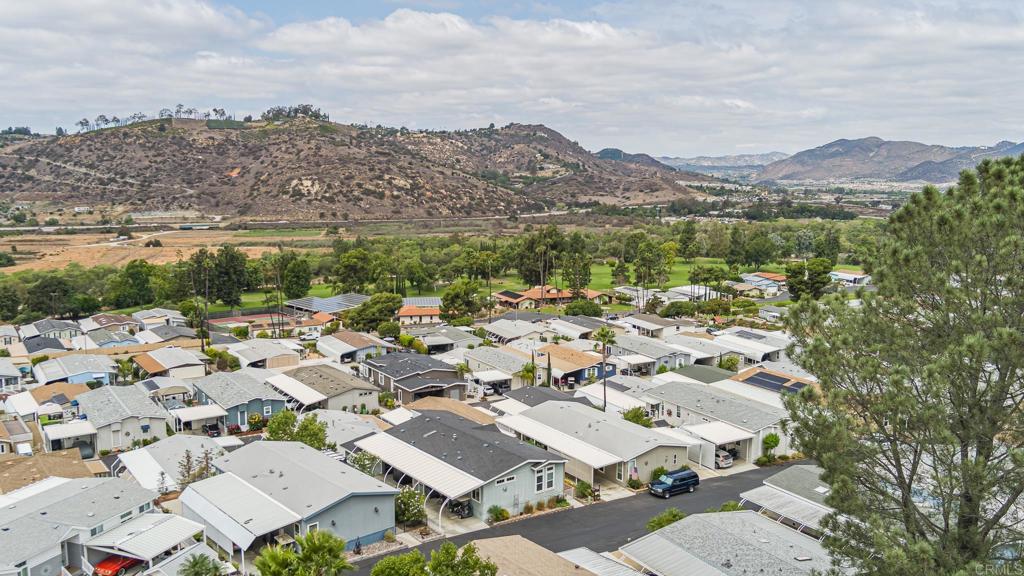 4650 Dulin Road, Unit 126 Fallbrook, CA 92003 - Photo 27 of 41 an aerial view of a city with lots of residential buildings