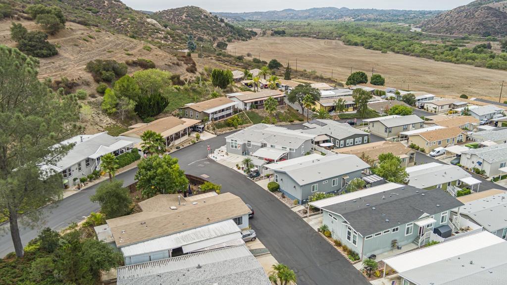 4650 Dulin Road, Unit 126 Fallbrook, CA 92003 - Photo 28 of 41 an aerial view of a city with lots of residential buildings