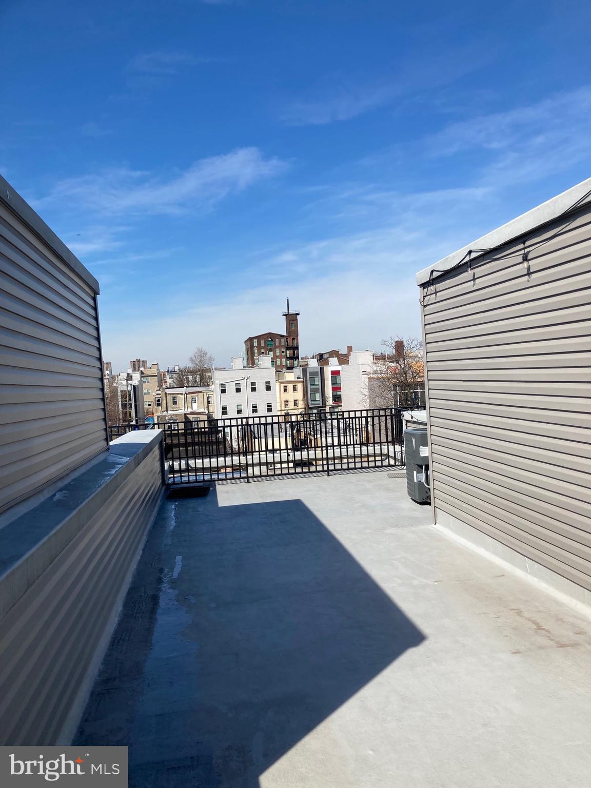 2553 North Front Street, Unit 3 Philadelphia, PA 19133 - Photo 15 of 16 a view of a balcony with wooden floor