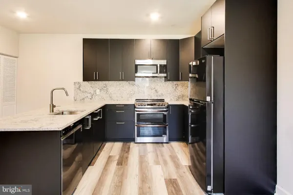 a view of staircase with white walls