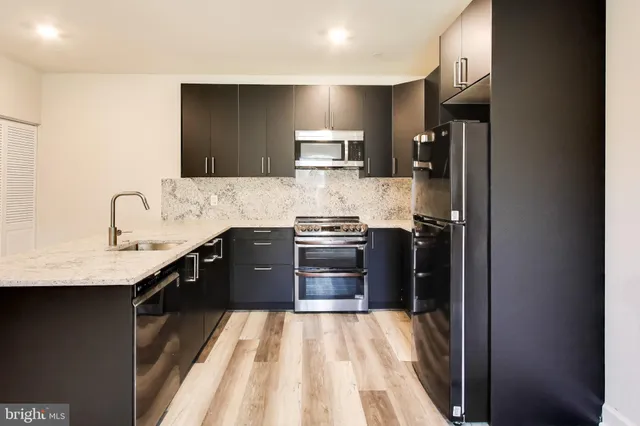 a view of staircase with white walls