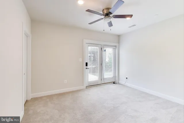 a utility room with washing machine
