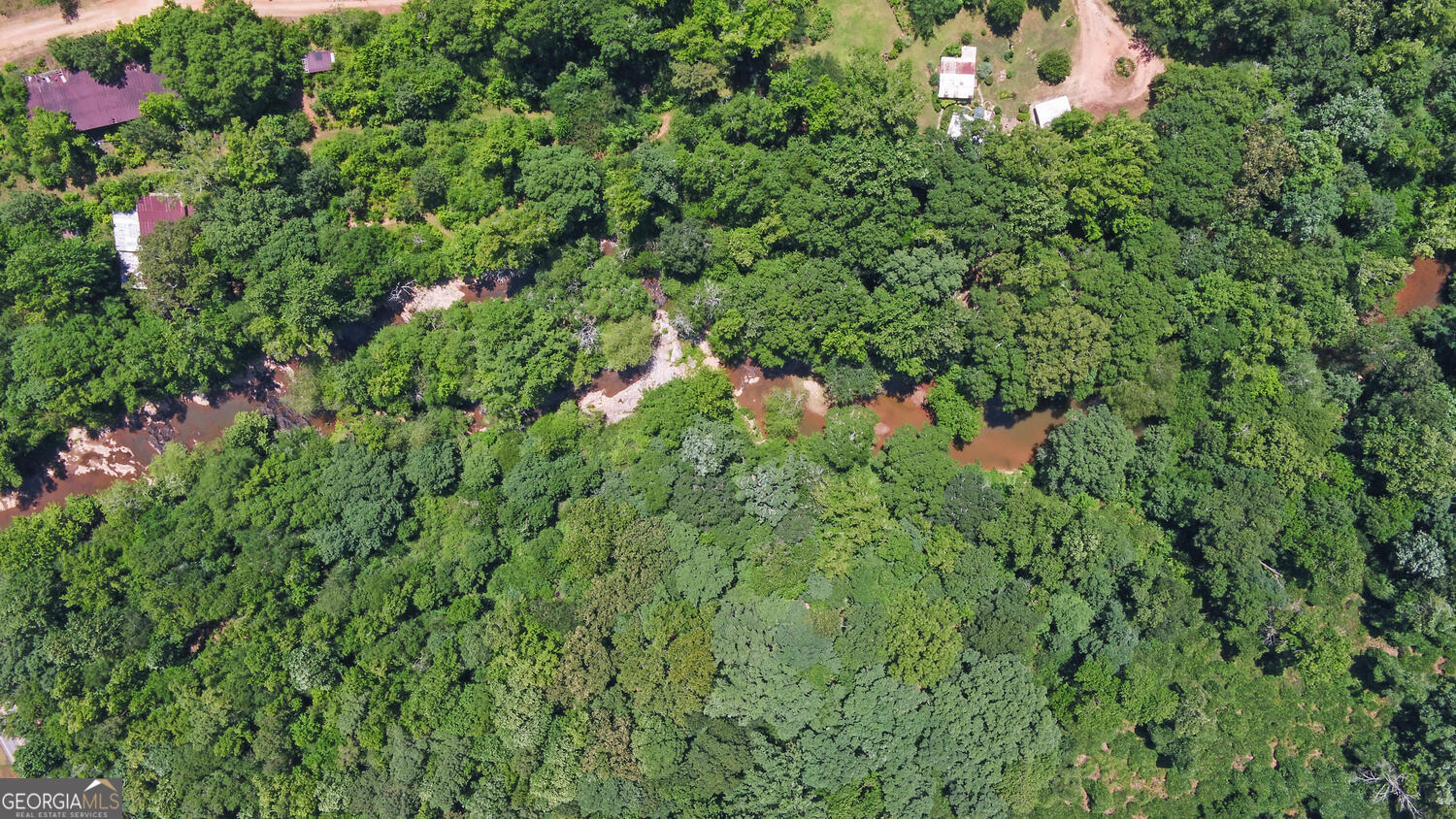 3439-tract 4 Providence Church Road Hartwell, GA 30643 - Photo 8 of 15 a view of a tree with a flower plants and wooden fence