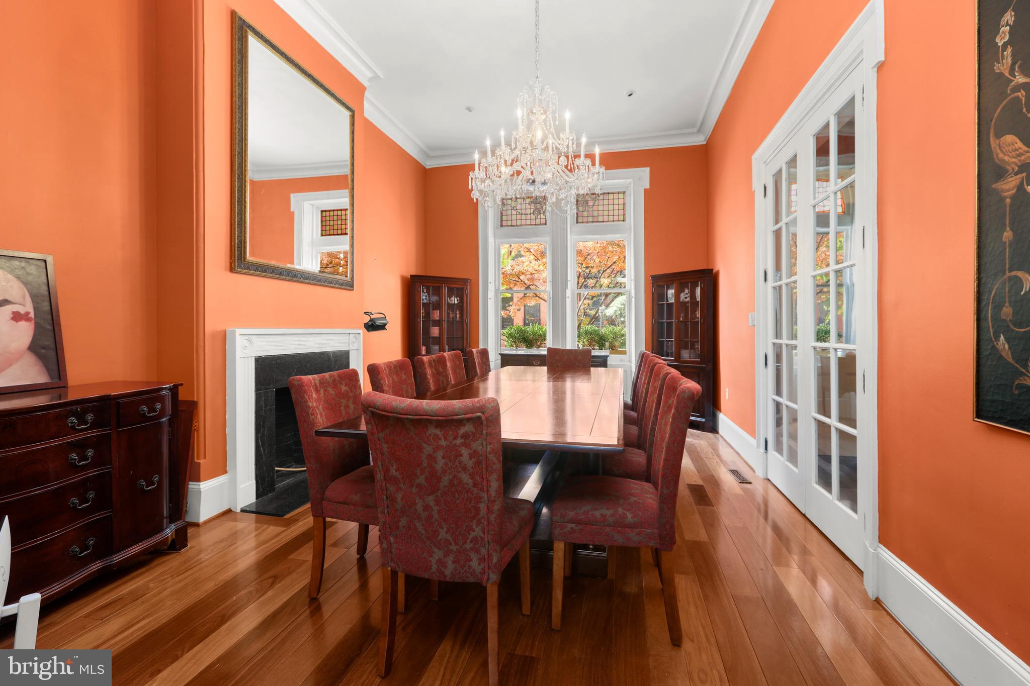 1007 North Calvert Street Baltimore, MD 21202 - Photo 12 of 43 a view of a dining room with furniture window and wooden floor