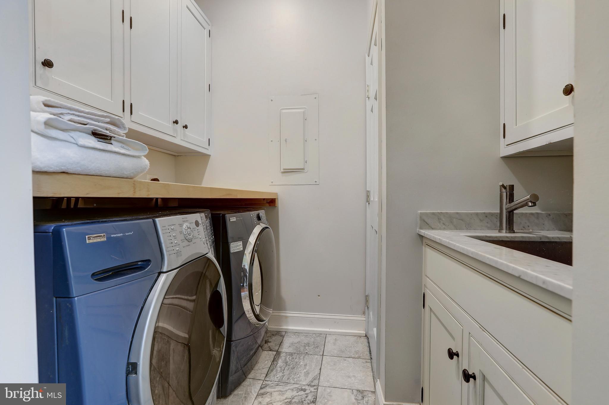 1007 North Calvert Street Baltimore, MD 21202 - Photo 29 of 43 a utility room with dryer and washer