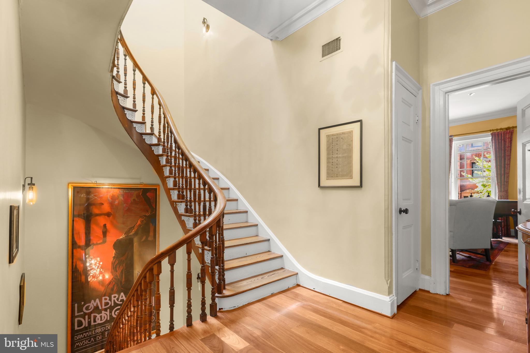 1007 North Calvert Street Baltimore, MD 21202 - Photo 33 of 43 a view of entryway and hall with wooden floor