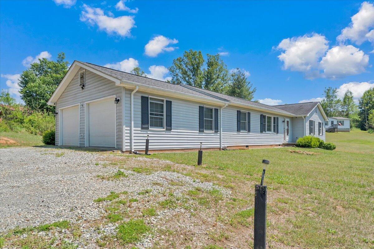 3870 Goose Dam Road Rocky Mount, VA 24151 - Photo 2 of 44 a house view with a garden space